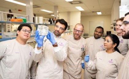 Dr Harendra Parekh (second from L) and research team looking at module